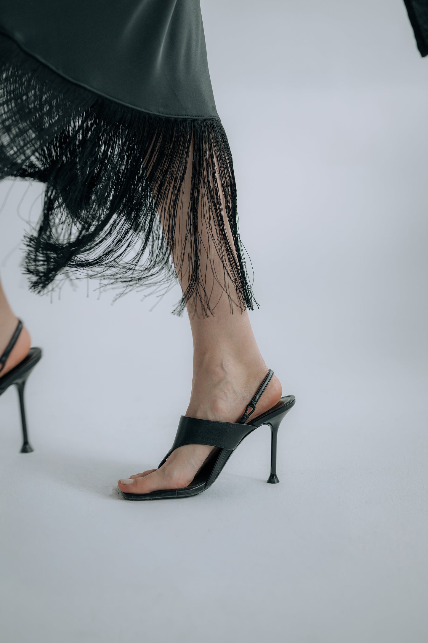 Obsidian fringe skirt